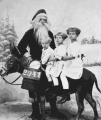 Old pic Santa and donkey with kids